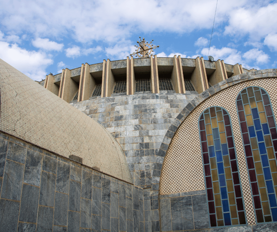 A religious building with a prominent cross on its roof, symbolizing its significance and purpose.