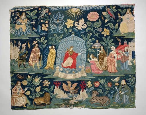 A tapestry showing the queen and her court, displaying regal figures in a grand setting.